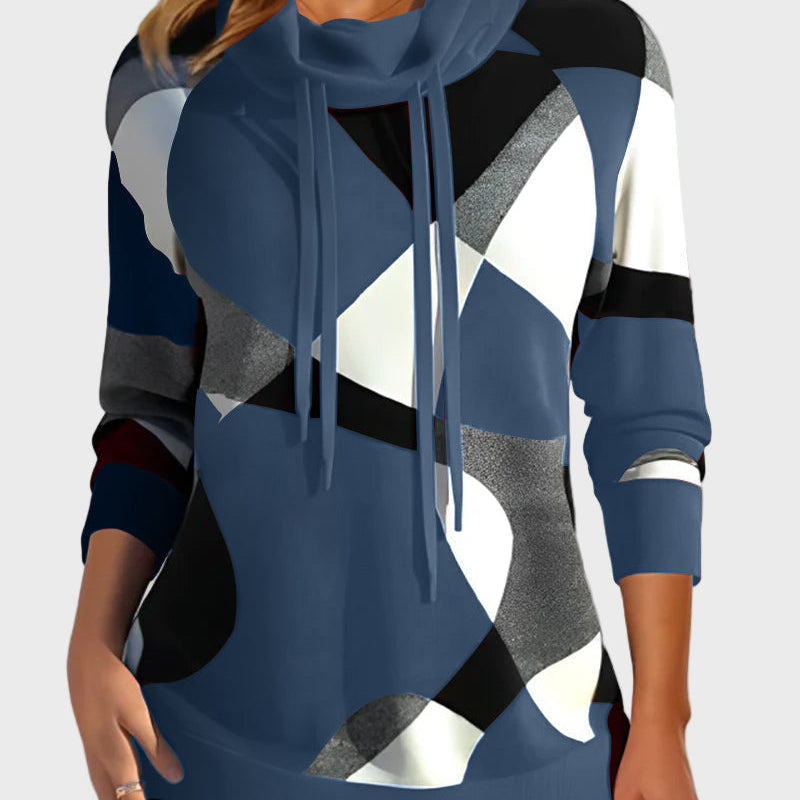 Pleteni pulover z umetniškim dizajnom in kapuco