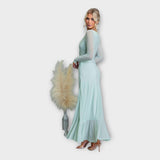 Impresivna Oblačila z Elegantno Linijo