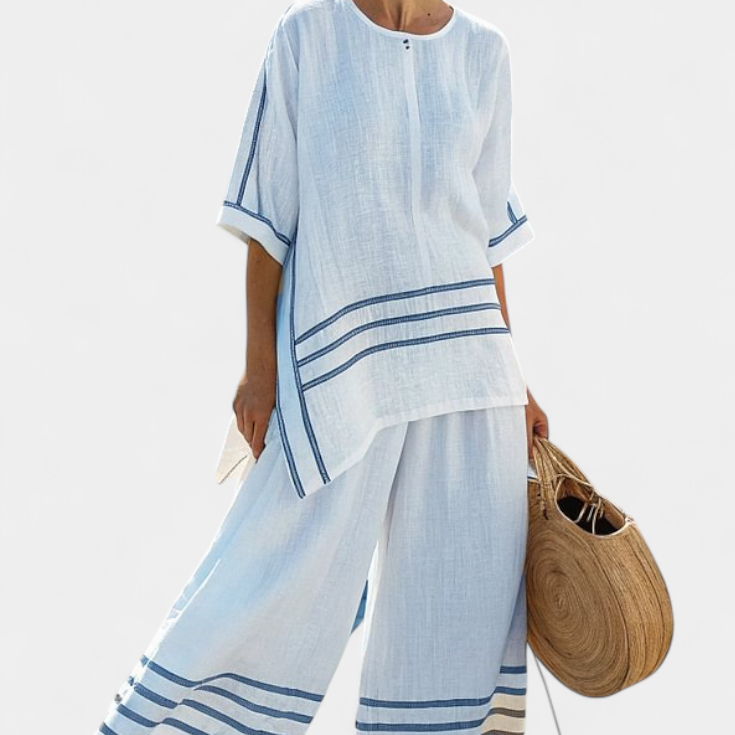 Salopeta s širokimi črtami in asimetričnim rezom - moderno in udobno stil