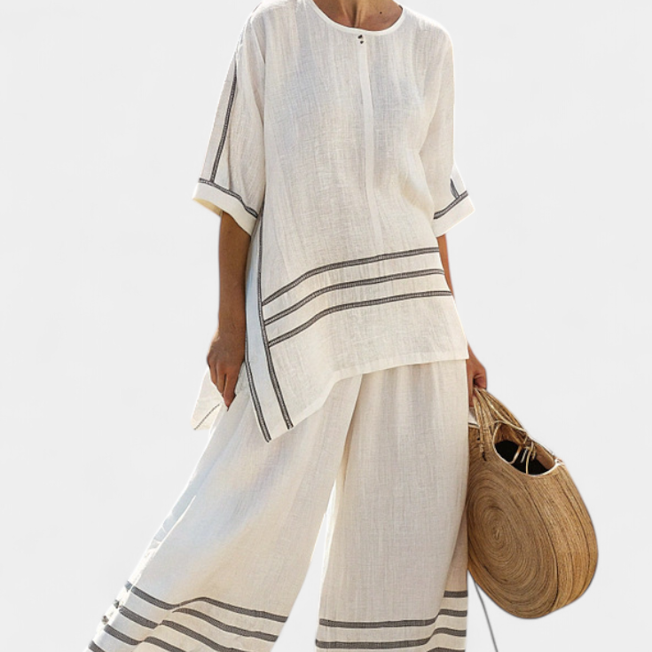 Salopeta s širokimi črtami in asimetričnim rezom - moderno in udobno stil