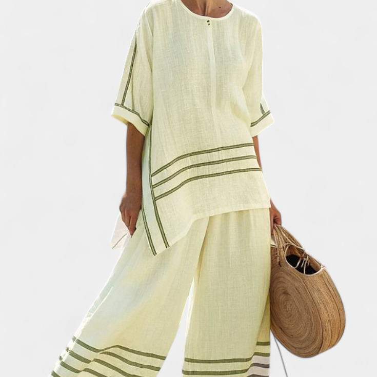 Salopeta s širokimi črtami in asimetričnim rezom - moderno in udobno stil