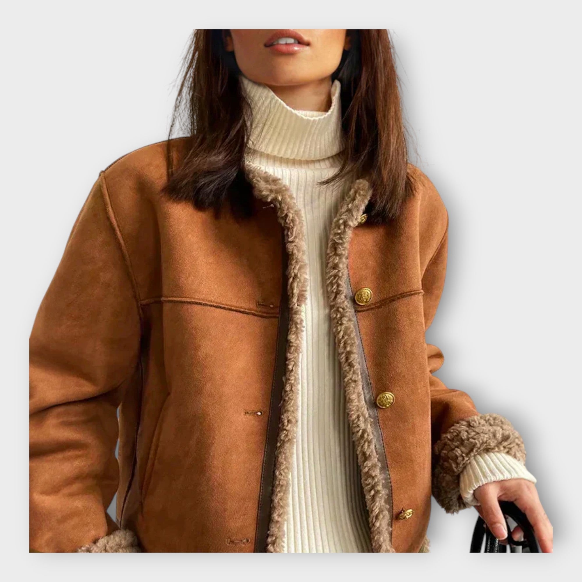 Eleganten usnjeni suknjič z toplim podlogom in brezčasnim slogom