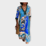 Večbarvna obleka s gumbi in 3/4 rokavi