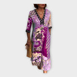 Večbarvna obleka s gumbi in 3/4 rokavi